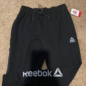 Reebok men’s black 3 pocket French terry pants size small. New with tags